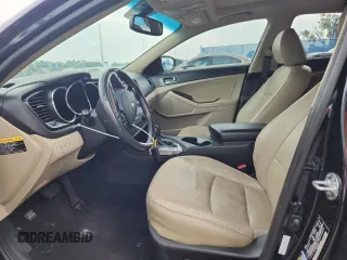 2013 Kia Optima EX z VIN 5XXGN4A79DG162815, wystawiony jako Copart lot #59282275 z przebiegiem 163 920 mil mil oraz Szkoda całkowita • Salvage title. Historia ofert i sprzedaży dostępna na DreamBid. Obrazek 7.