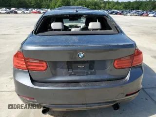 2012 BMW 3 Series 335i with VIN WBA3A9C5XCF474803, listed as a Copart auction lot 57940675 with 121,960 mi miles and Salvage title. Bid and sale history available at DreamBid. Image 6.