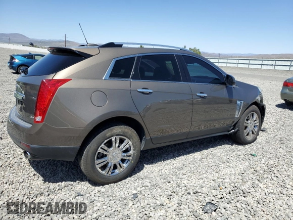 2015 Cadillac SRX Luxury Collection z VIN 3GYFNBE35FS555046, wystawiony jako Copart lot #57589155 z przebiegiem 108 456 mil mil oraz Szkoda całkowita • Salvage title. Historia ofert i sprzedaży dostępna na DreamBid. Obrazek 3.
