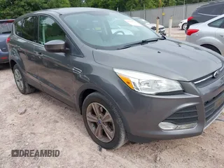 2013 Ford Escape SE z VIN 1FMCU0G96DUC26799, wystawiony jako IAAI lot #42751599 z przebiegiem 116 312 mil mil oraz . Historia ofert i sprzedaży dostępna na DreamBid. Obrazek 1.