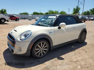 2016 MINI Convertible S z VIN WMWWG9C58G3A91299, wystawiony jako Copart lot #55356565 z przebiegiem 87 333 mil mil oraz Szkoda całkowita • Salvage title. Historia ofert i sprzedaży dostępna na DreamBid. Obrazek 1.