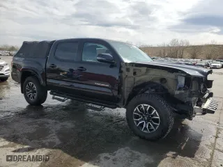 2020 Toyota Tacoma 4WD SR5 with VIN 3TMCZ5AN3LM332543, listed as a Copart auction lot 50872735 with 92,396 mi miles and Salvage Title. Bid and sale history available at carsss.com. Image 4.