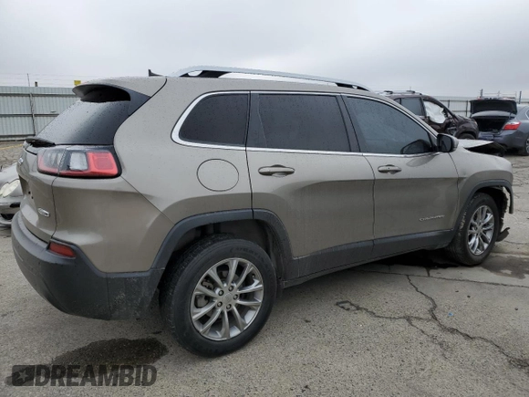2021 Jeep Cherokee Altitude with VIN 1C4PJLLB3MD169129, listed as a Copart auction lot 82715734 with 59,468 mi miles and Salvage Title. Bid and sale history available at carsss.com. Image 3.