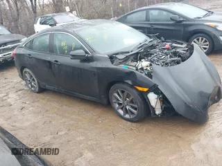 2019 Honda Civic Sedan EX with VIN 19XFC1F34KE014454, listed as a IAAI auction lot 41485090 with 70,571 mi miles. Bid and sale history available at carsss.com. Image 1.