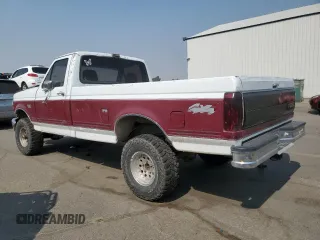 1992 Ford F-150 with VIN 1FTEF14HXNPA24587, listed as a Copart auction lot 70803324 with 0 mi miles and Salvage Title. Bid and sale history available at carsss.com. Image 2.