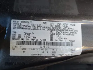 2015 Ford Focus Titanium with VIN 1FADP3J28FL348625, listed as a IAAI auction lot 41674741 with 223,585 mi miles and . Bid and sale history available at carsss.com. Image 9.
