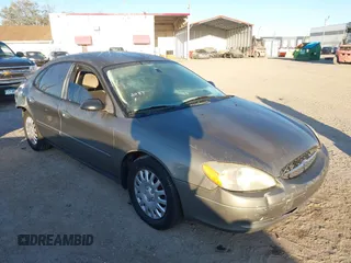 2003 Ford Taurus LX Standard z VIN 1FAFP52U33A235063, wystawiony jako IAAI lot #41777293 z przebiegiem 164 125 mil mil oraz . Historia ofert i sprzedaży dostępna na DreamBid. Obrazek 1.