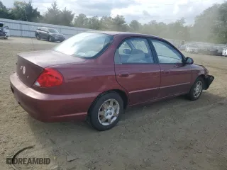 2003 Kia Spectra with VIN KNAFB121935241589, listed as a Copart auction lot 71933194 with 61,738 mi miles and Salvage Title. Bid and sale history available at carsss.com. Image 3.