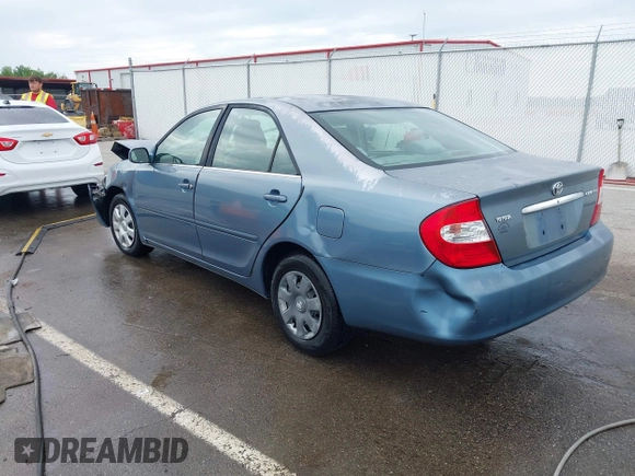 2002 Toyota Camry LE z VIN 4T1BE32KX2U617732, wystawiony jako IAAI lot #42208913 z przebiegiem Nie podano mil oraz . Historia ofert i sprzedaży dostępna na DreamBid. Obrazek 3.