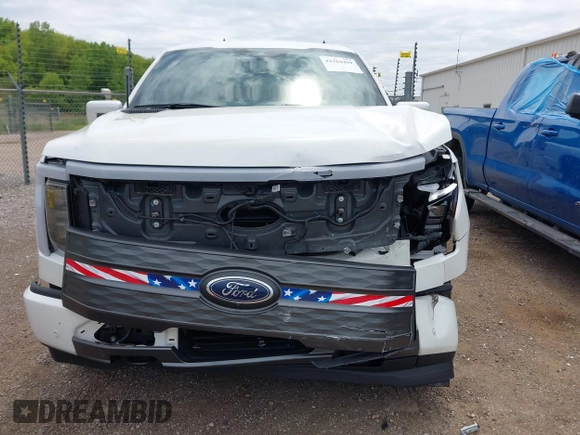 2022 Ford F-150 Lightning Pro with VIN 1FTVW1EL3NWG16132, listed as a IAAI auction lot 42362459 with 16,509 mi miles and . Bid and sale history available at DreamBid. Image 13.
