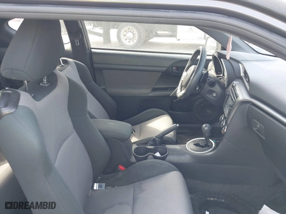 2015 Scion tC with VIN JTKJF5C71FJ013747, listed as a IAAI auction lot 42087740 with 138,097 mi miles. Bid and sale history available at carsss.com. Image 5.