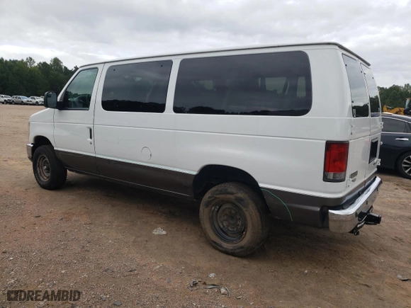 2014 Ford Econoline Wagon XL with VIN 1FBNE3BL0EDA92960, listed as a Copart auction lot 68583924 with 73,153 mi miles and Salvage Title. Bid and sale history available at carsss.com. Image 2.