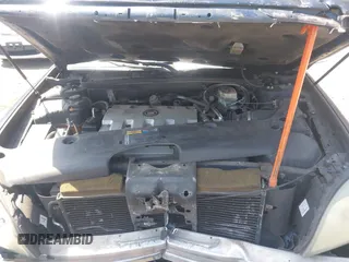 2002 Cadillac DeVille DTS with VIN 1G6KF57912U205527, listed as a IAAI auction lot 42064174 with 135,002 mi miles. Bid and sale history available at carsss.com. Image 10.