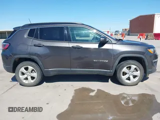 2018 Jeep Compass Altitude with VIN 3C4NJDBBXJT185252, listed as a IAAI auction lot 41847785 with 126,915 mi miles and . Bid and sale history available at carsss.com. Image 14.