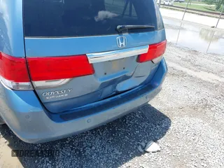 2010 Honda Odyssey Touring with VIN 5FNRL3H93AB058240, listed as a IAAI auction lot 42211192 with 223,859 mi miles and . Bid and sale history available at DreamBid. Image 6.