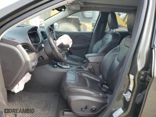 2015 Jeep Cherokee Trailhawk with VIN 1C4PJMBSXFW687205, listed as a Copart auction lot 53128545 with 86,876 mi miles and Salvage Title. Bid and sale history available at carsss.com. Image 7.
