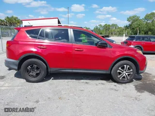 2014 Toyota RAV4 LE with VIN JTMZFREV4EJ005203, listed as a IAAI auction lot 42022295 with 130,193 mi miles. Bid and sale history available at carsss.com. Image 14.