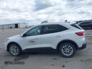 2020 Ford Escape SE with VIN 1FMCU9G67LUC31633, listed as a IAAI auction lot 42173290 with 136,937 mi miles and . Bid and sale history available at DreamBid. Image 14.