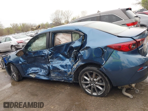 2018 Mazda 3 Touring with VIN 3MZBN1V35JM217641, listed as a IAAI auction lot 41943433 with 64,884 mi miles. Bid and sale history available at carsss.com. Image 14.