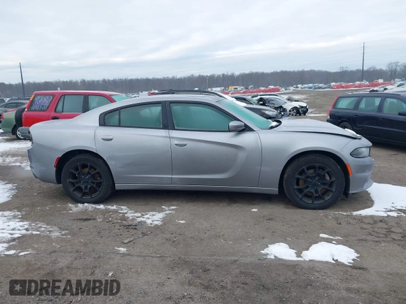 2015 Dodge Charger SXT z VIN 2C3CDXJGXFH891493, wystawiony jako IAAI lot #41316110 z przebiegiem 161 281 mil mil oraz . Historia ofert i sprzedaży dostępna na DreamBid. Obrazek 13.