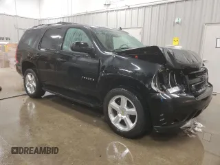 2009 Chevrolet Tahoe 2LT z VIN 1GNFK23079J123191, wystawiony jako Copart lot #42431945 z przebiegiem 57 206 mil mil oraz Czysty tytuł • Clean title. Historia ofert i sprzedaży dostępna na DreamBid. Obrazek 4.