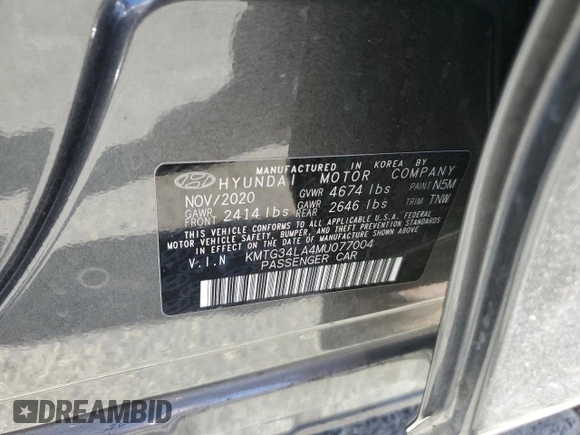 2021 Genesis G70 2.0T with VIN KMTG34LA4MU077004, listed as a Copart auction lot 71836194 with 51,624 mi miles and Salvage title. Bid and sale history available at DreamBid. Image 12.