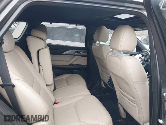 2016 Mazda CX-9 Grand Touring with VIN JM3TCADY4G0111310, listed as a IAAI auction lot 41532851 with 178,907 mi miles and . Bid and sale history available at DreamBid. Image 8.