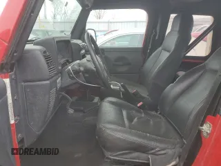 2006 Jeep Wrangler SE with VIN 1J4FA29156P757467, listed as a Copart auction lot 50610065 with 134,848 mi miles and Salvage Title. Bid and sale history available at carsss.com. Image 7.