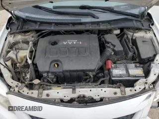 2010 Toyota Corolla with VIN 1NXBU4EE7AZ256666, listed as a Copart auction lot 79097074 with 65,537 mi miles and Salvage title. Bid and sale history available at DreamBid. Image 12.