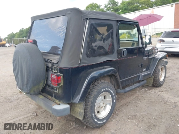 2001 Jeep Wrangler Sahara with VIN 1J4FA59S41P358035, listed as a IAAI auction lot 42685488 with 120,630 mi miles and . Bid and sale history available at DreamBid. Image 4.