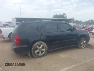 2007 Chevrolet Tahoe LT z VIN 1GNFK13097R132998, wystawiony jako IAAI lot #42257393 z przebiegiem 288 126 mil mil oraz . Historia ofert i sprzedaży dostępna na DreamBid. Obrazek 12.