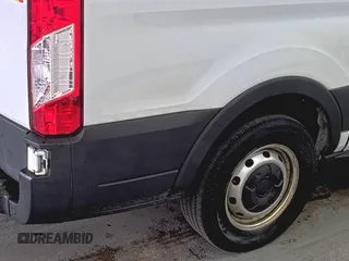 2019 Ford Transit with VIN 1FTYE1YM0KKB31938, listed as a IAAI auction lot 42667322 with 196,239 mi miles and . Bid and sale history available at DreamBid. Image 31.