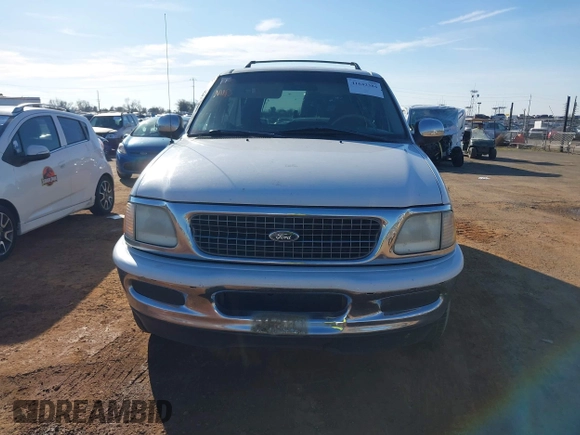 1998 Ford Expedition XLT with VIN 1FMRU1768WLA48604, listed as a IAAI auction lot 41642384 with 274,424 mi miles. Bid and sale history available at carsss.com. Image 6.
