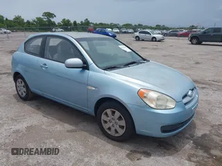 2010 Hyundai Accent GS z VIN KMHCM3AC6AU166878, wystawiony jako IAAI lot #42426645 z przebiegiem 168 224 mil mil oraz . Historia ofert i sprzedaży dostępna na DreamBid. Obrazek 1.