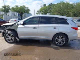 2014 Infiniti QX60 with VIN 5N1AL0MM0EC525019, listed as a IAAI auction lot 42035281 with 137,831 mi miles. Bid and sale history available at carsss.com. Image 14.