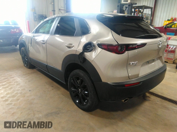 2024 Mazda CX-30 2.5 S Select Sport with VIN 3MVDMBBM0RM658069, listed as a IAAI auction lot 42130803 with 26,714 mi miles. Bid and sale history available at carsss.com. Image 3.