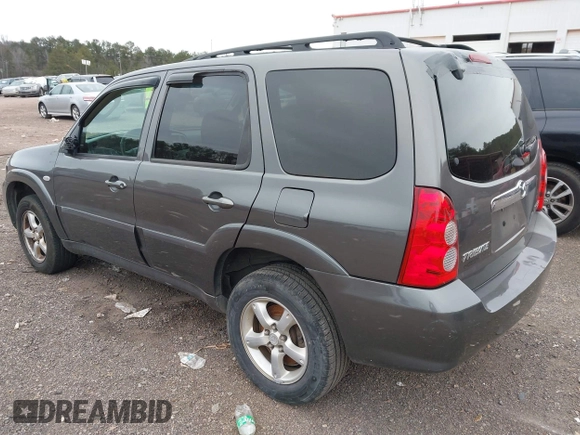 2006 Mazda Tribute S with VIN 4F2YZ04196KM12510, listed as a IAAI auction lot 41382627 with 242,650 mi miles and . Bid and sale history available at DreamBid. Image 3.
