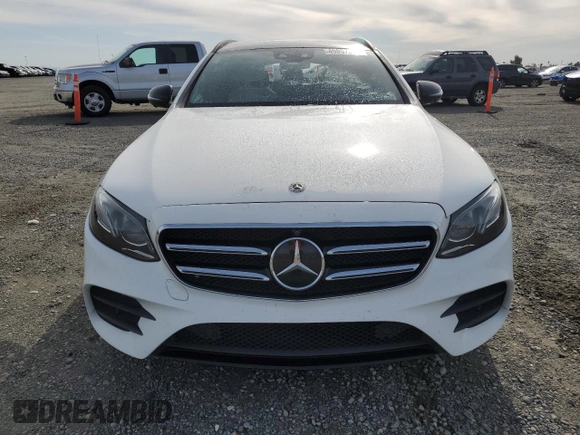 2019 Mercedes-Benz E 450 with VIN WDDZH6JB6KA671808, listed as a Copart auction lot 49857245 with 99,709 mi miles and Salvage Title. Bid and sale history available at DreamBid. Image 5.