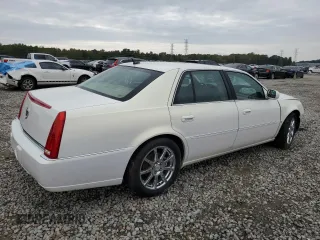 2007 Cadillac DTS Performance z VIN 1G6KD57907U171271, wystawiony jako Copart lot #79007574 z przebiegiem 147 504 mil mil oraz Szkoda całkowita • Salvage title. Historia ofert i sprzedaży dostępna na DreamBid. Obrazek 3.