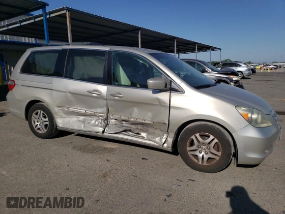 2005 Honda Odyssey EX-L with VIN 5FNRL38735B079366, listed as a Copart auction lot 53980645 with 241,156 mi miles and Salvage Title. Bid and sale history available at carsss.com. Image 4.