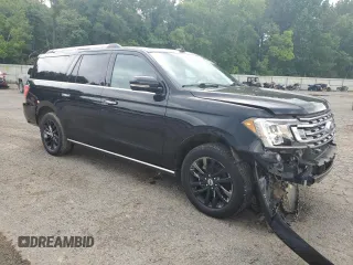 2019 Ford Expedition Max Limited with VIN 1FMJK1KT1KEA19735, listed as a Copart auction lot 56634085 with 147,154 mi miles and Salvage title. Bid and sale history available at DreamBid. Image 4.