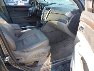 2011 Cadillac SRX Performance Collection with VIN 3GYFNBEYXBS527765, listed as a IAAI auction lot 41904013 with 168,318 mi miles and . Bid and sale history available at carsss.com. Image 5.