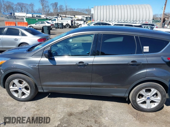 2016 Ford Escape SE with VIN 1FMCU9GX7GUA58243, listed as a IAAI auction lot 41856764 with 50,129 mi miles and . Bid and sale history available at DreamBid. Image 15.