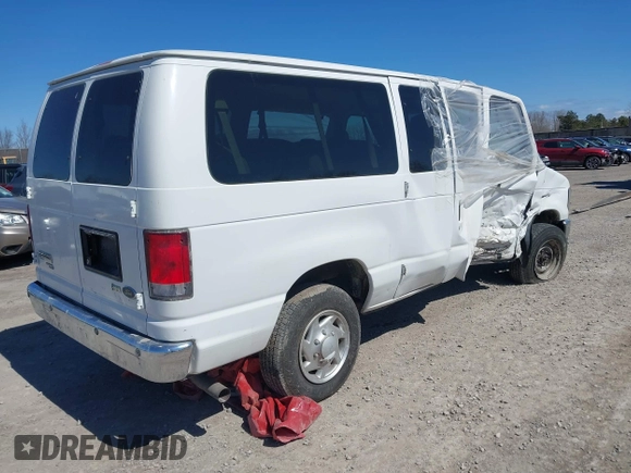 2014 Ford Econoline Passenger XL with VIN 1FBNE3BL1EDA97942, listed as a IAAI auction lot 40899589 with 60,703 mi miles. Bid and sale history available at carsss.com. Image 4.