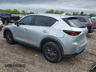 2020 Mazda CX-5 Touring z VIN JM3KFBCM2L0750223, wystawiony jako Copart lot #56300415 z przebiegiem 87 392 mil mil oraz Szkoda całkowita • Salvage title. Historia ofert i sprzedaży dostępna na DreamBid. Obrazek 2.