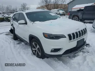 2020 Jeep Cherokee Limited with VIN 1C4PJMDXXLD589890, listed as a IAAI auction lot 41603460 with 64,646 mi miles. Bid and sale history available at carsss.com. Image 1.