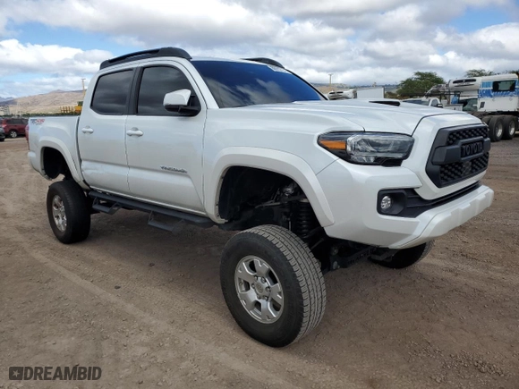 2022 Toyota Tacoma 4WD SR with VIN 3TYCZ5AN7NT101670, listed as a Copart auction lot 86912734 with 21,376 mi miles and Salvage Title. Bid and sale history available at carsss.com. Image 4.