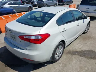2014 Kia Forte LX with VIN KNAFK4A63E5115830, listed as a IAAI auction lot 42087188 with 111,660 mi miles. Bid and sale history available at carsss.com. Image 4.