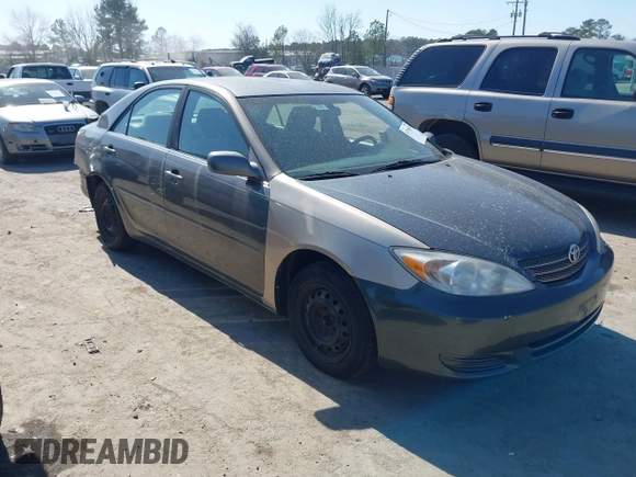 2003 Toyota Camry LE with VIN 4T1BE32K63U659008, listed as a IAAI auction lot 41790929 with 206,878 mi miles and . Bid and sale history available at DreamBid. Image 1.