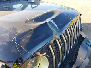 2023 Jeep Wrangler Sahara with VIN 1C4JJXP63PW525274, listed as a IAAI auction lot 41743099 with 38,484 mi miles and . Bid and sale history available at DreamBid. Image 17.
